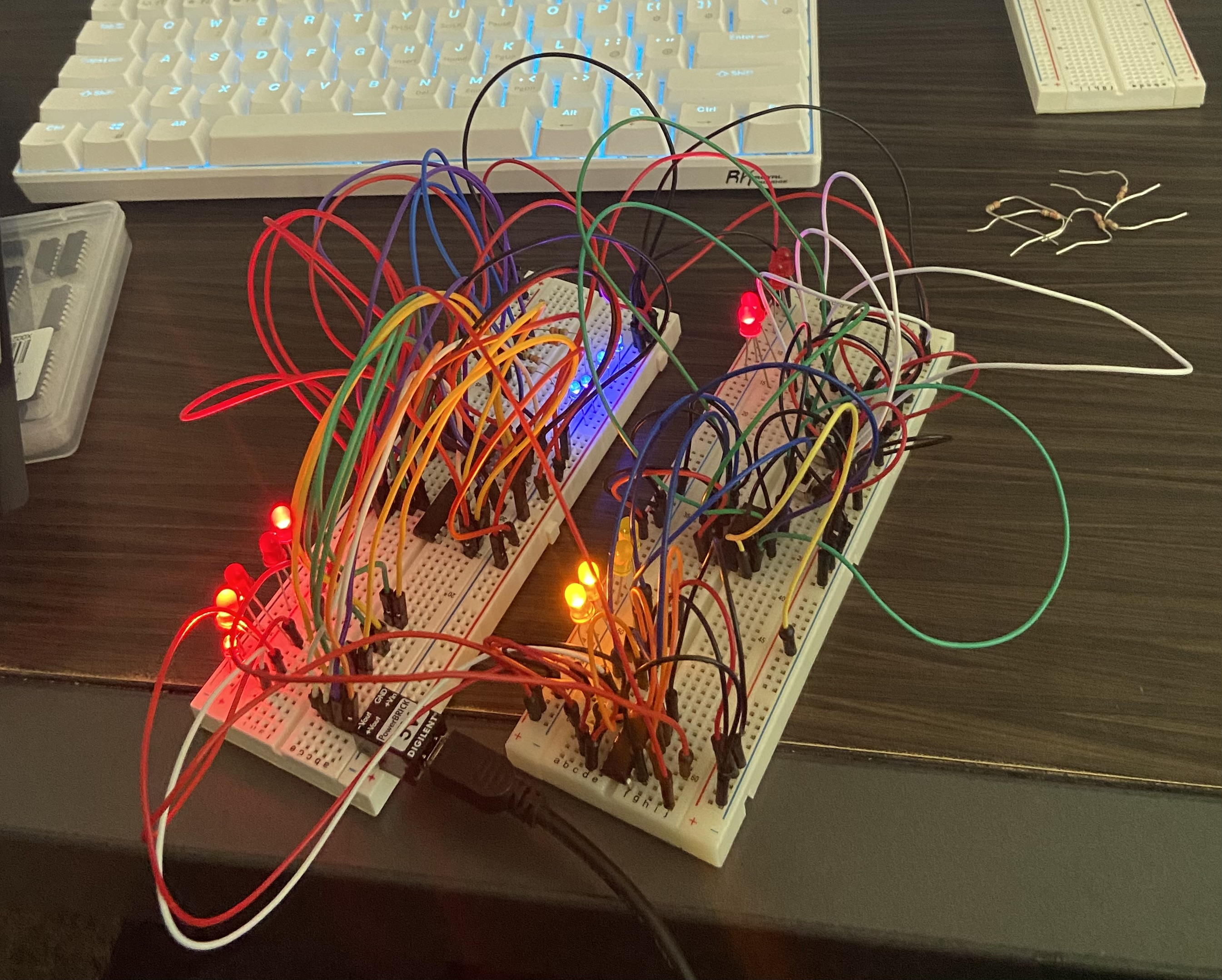 Four-bit LED calculator breadboard implementation